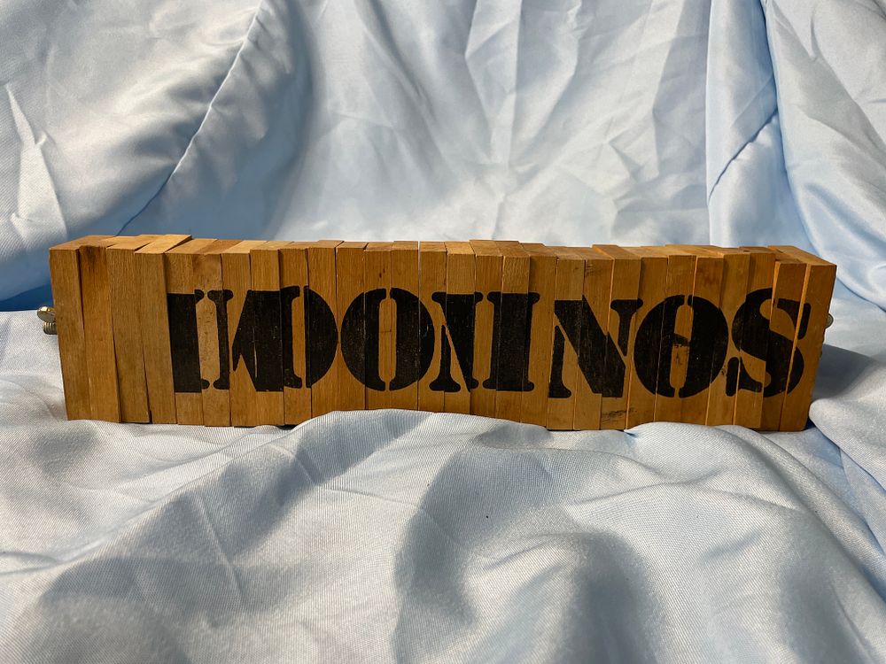 Lot 285: A Set of Vintage Wooden Domino Blocks on Rod