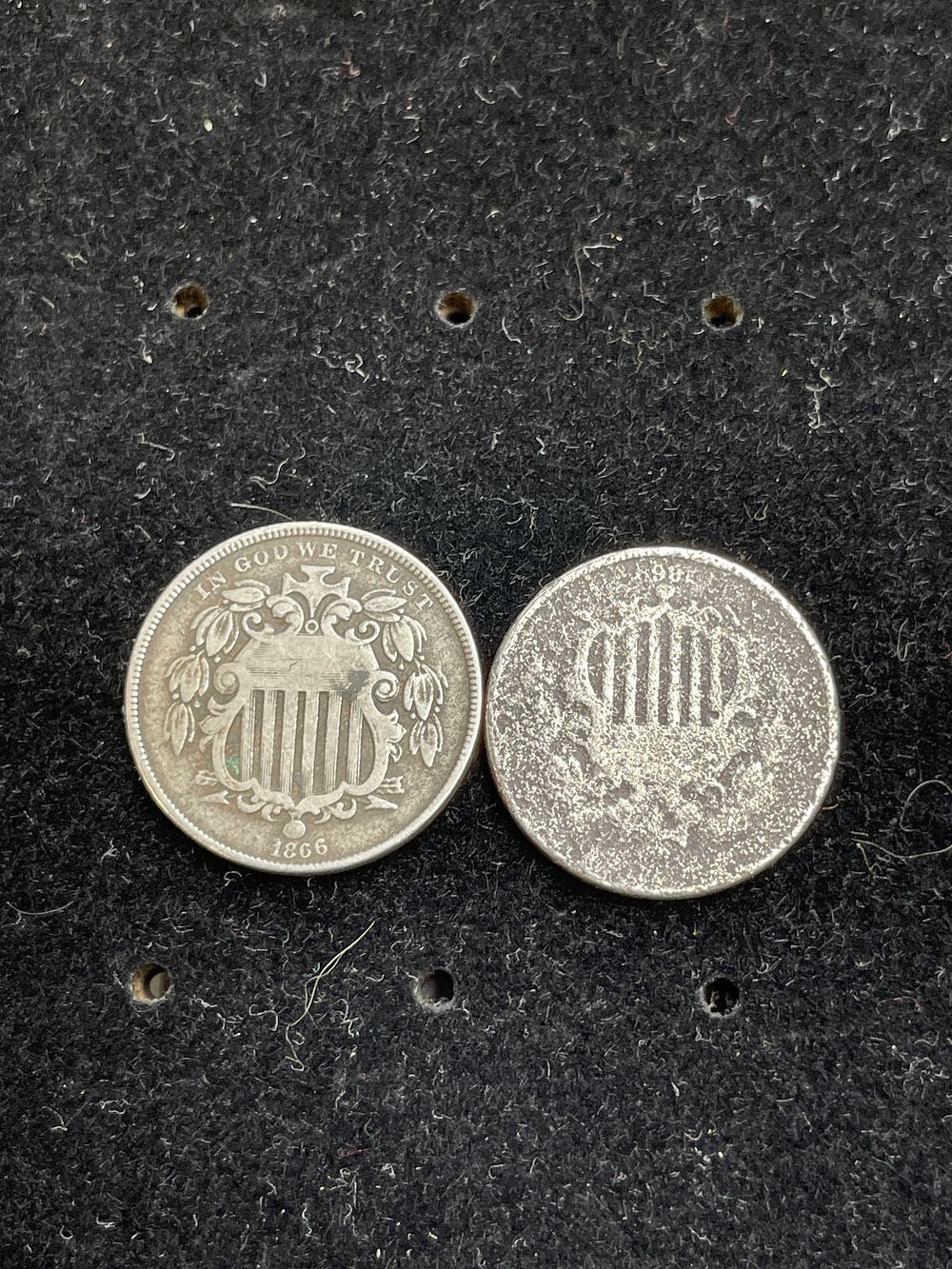 Lot 327: A Pair of United States Shield Nickels, dated 1866 and 1865