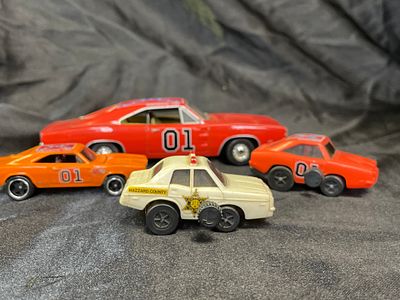 A Collection of Dukes of Hazzard Toy Vehicles, including Knickerbocker Wrist Racers, Corgi, and 