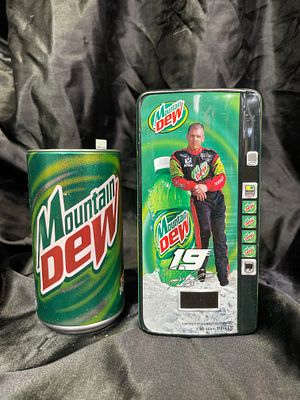 A Pair of Action Performance Mountain Dew NASCAR 1:64-Scale Collectible Tins, comprising a 