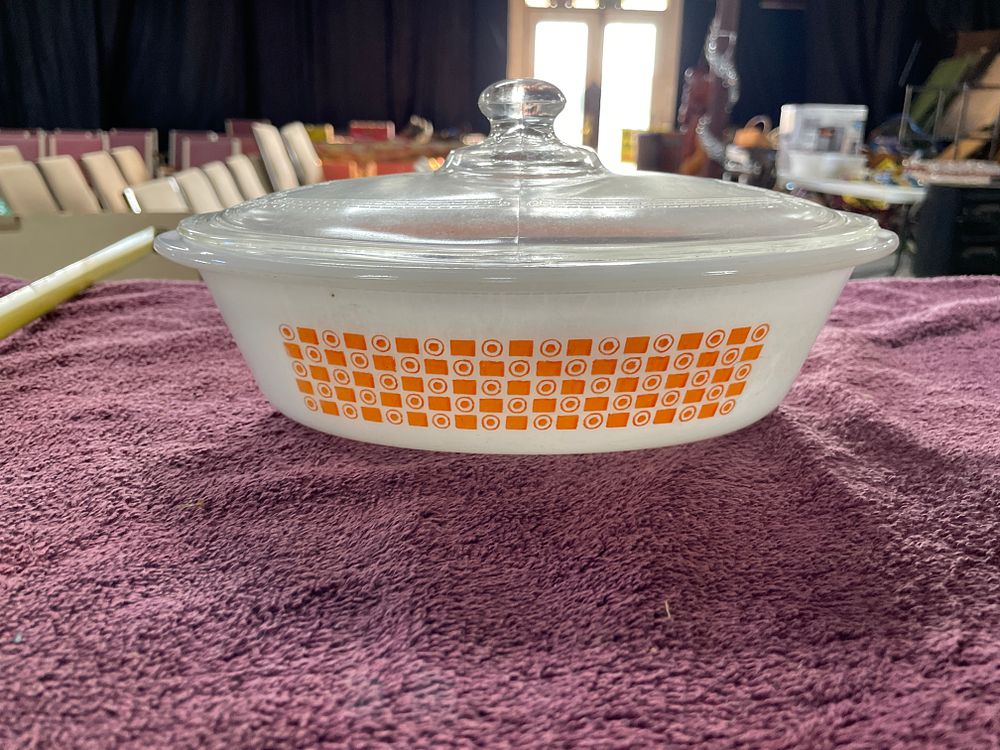 Lot 180: A Pair of Glasbake Orange Geometric Casserole Dish and Fire King Philbe Style Lid