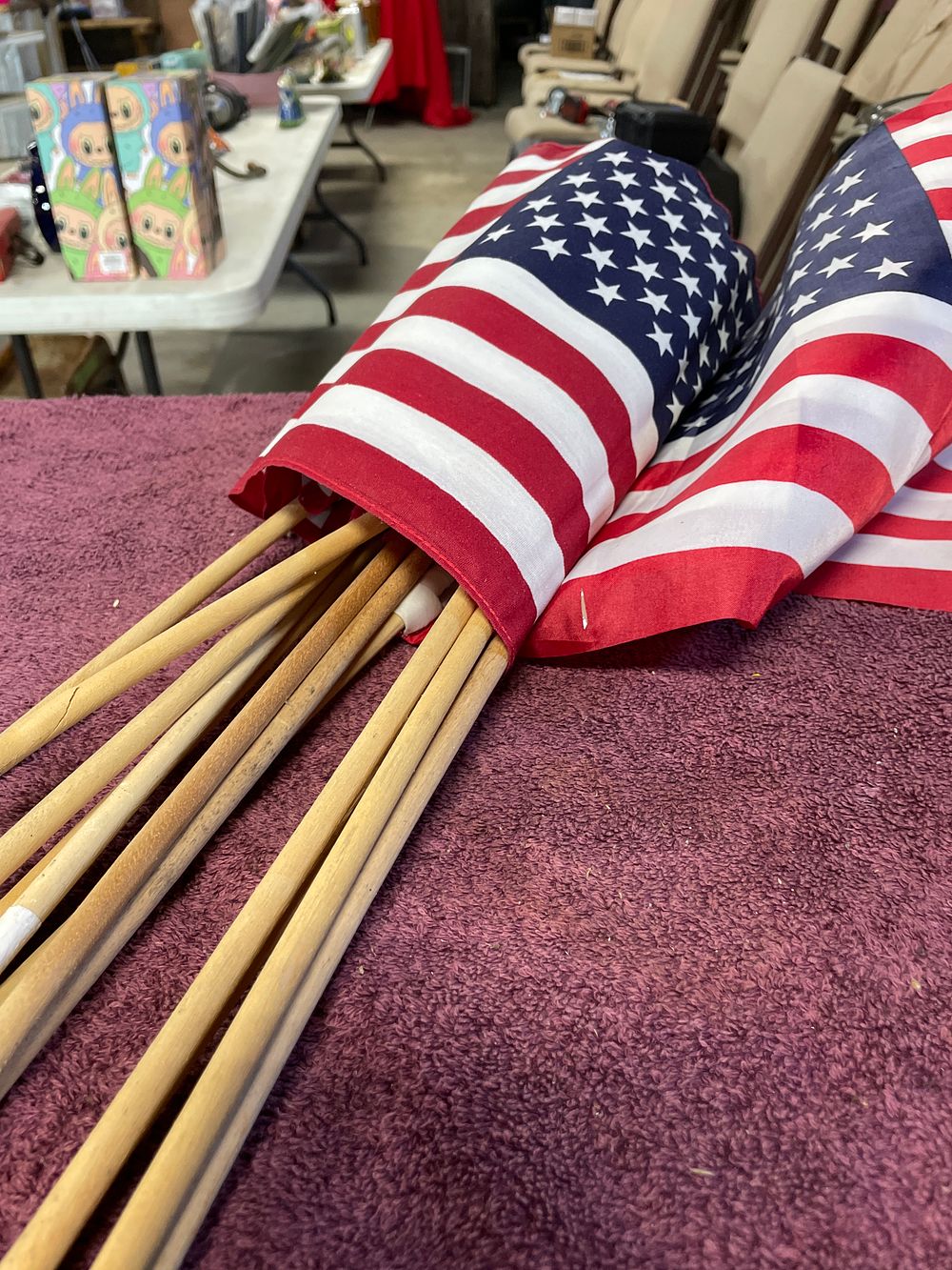 Lot 218: A Collection of 13 Used 50-Star American Handheld Stick Flags