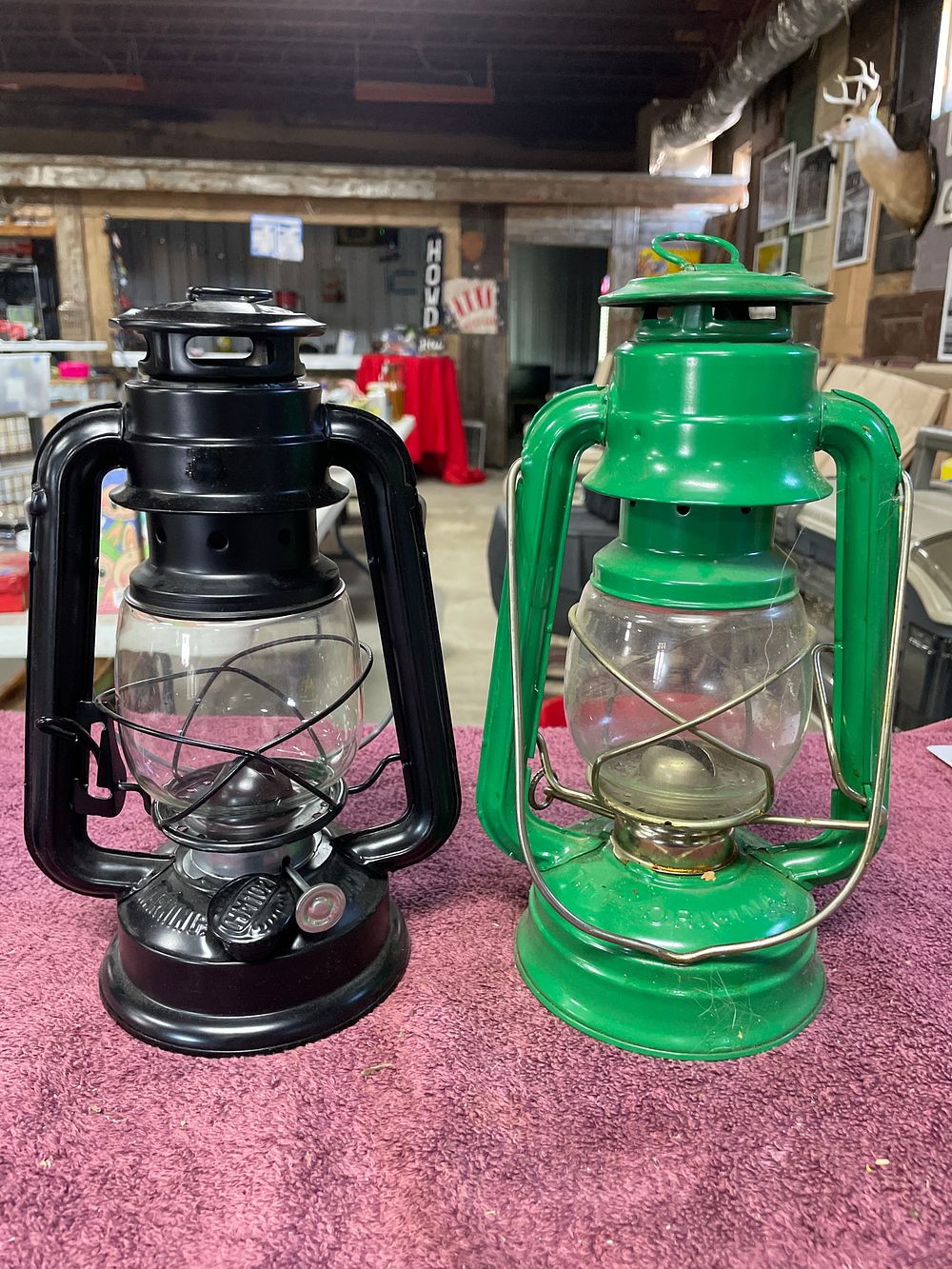 Lot 223: A Pair of Kerosene Hurricane Lanterns