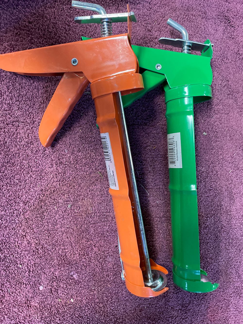 Lot 228: A Pair of Contemporary Metal Caulk Guns, HDX and L G Sourcing