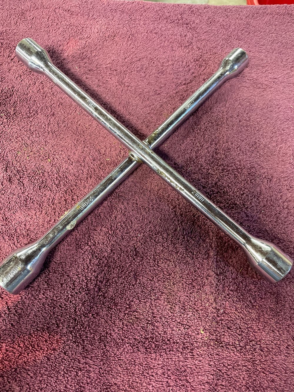 Lot 232: Chrome-Plated Steel Four-Way Universal Lug Wrench