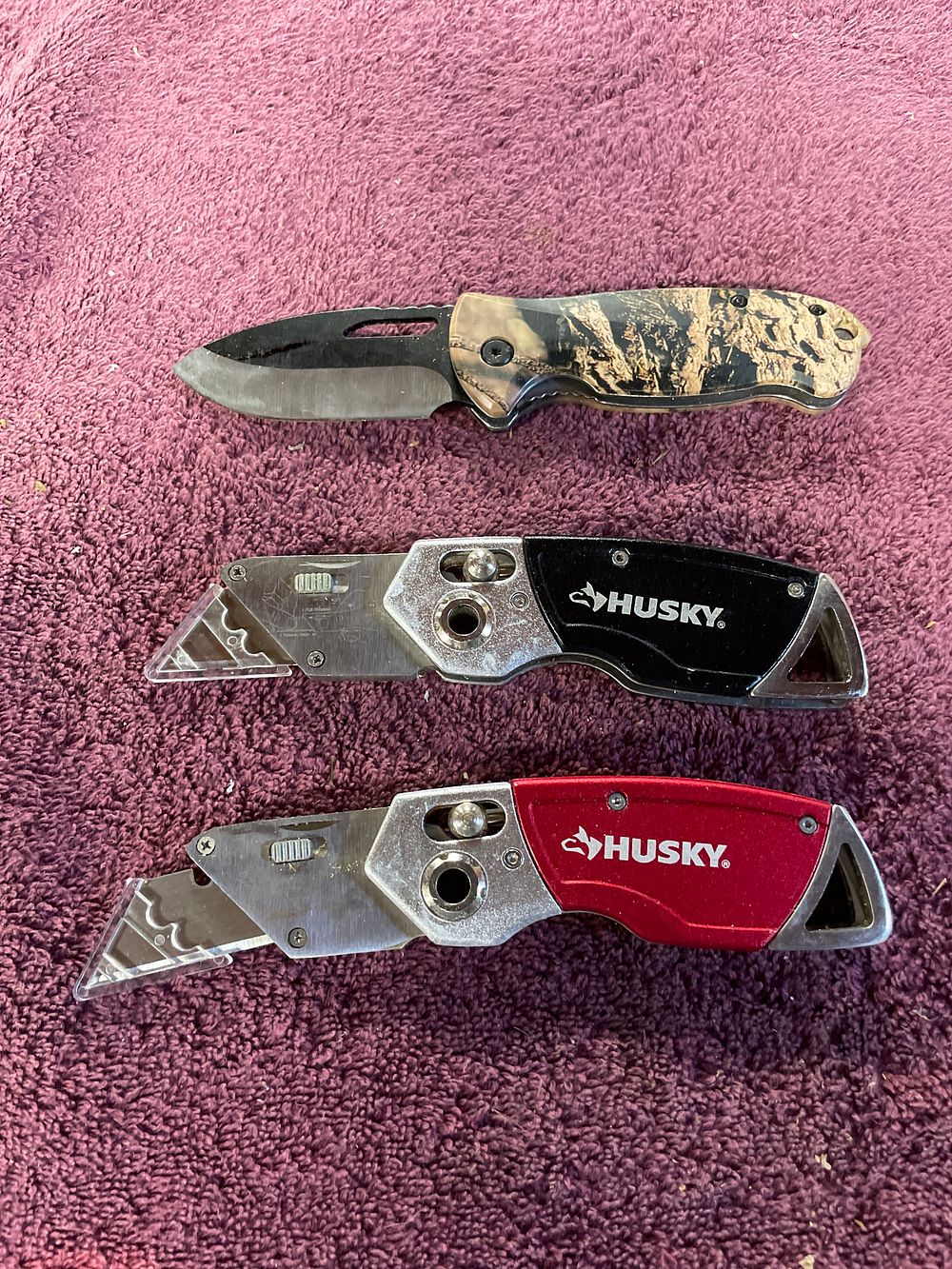 Lot 239: Three Folding Cutting Tools Including Two Husky Lock-Back Utility Knives
