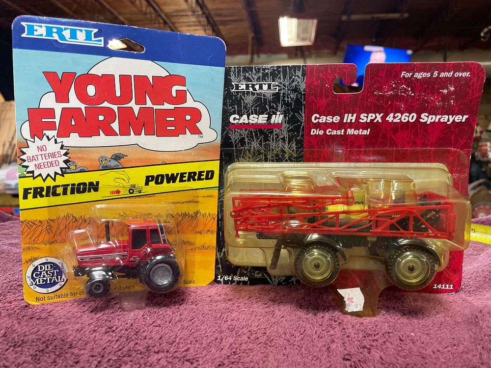 Lot 180: A Pair of Ertl Die-Cast Model Farm Vehicles International 484 Tractor and Case IH SPX 4260 Sprayer