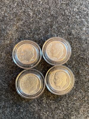 A Group of Silver Roosevelt Dimes Dated 1946-1961. Several silver Roosevelt dimes dated 1946 