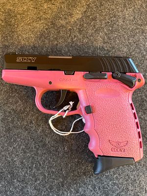 SCCY CPX-1 9mm Semi-Automatic Handgun with Pink Frame. A SCCY CPX-1 9mm semi-automatic pistol 