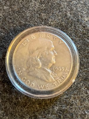 1963 D Benjamin Franklin Silver Half Dollar Coin. A silver 1963 Benjamin Franklin half dollar 