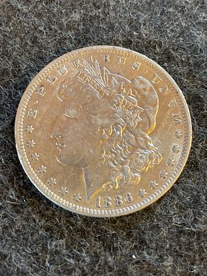 1886 United States Morgan Silver Dollar Coin may of been cleaned at some point in life super 