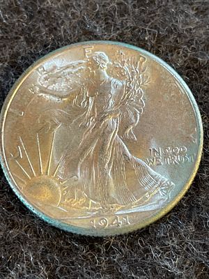 1941 United States Walking Liberty Silver Half Dollar. A silver-toned 1941 United States Walking 