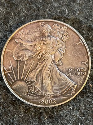 2002 United States American Silver Eagle One Dollar Coin. A 2002 United States American Silver 