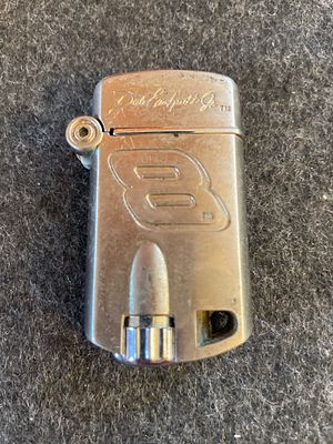 Dale Earnhardt Jr. Number 8 NASCAR Silver Tone Gas Lighter. A silver-colored NASCAR gas lighter 