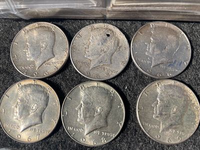 A Collection of United States Kennedy Half Dollars 1964-1969. A collection of silver and 