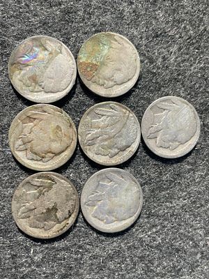 A Collection of US Mint Buffalo Nickels. A collection of circulated silver-colored Buffalo 