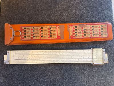 Keuffel and Esser Slide Rule with Leather Case. A white K&amp;E slide rule featuring serial 