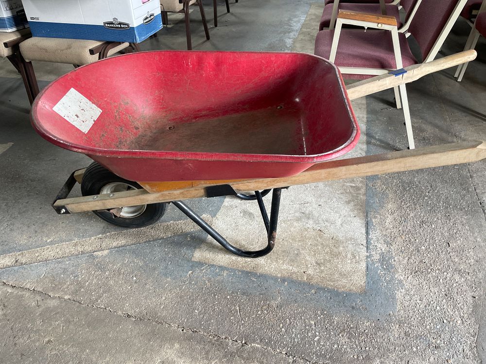 Lot 152: Red Wheelbarrow with Wooden Handles and Metal Frame