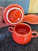 Fiesta Ceramic Cream and Sugar Set with Tray. A three-piece orange-red ceramic set featuring a Image - 2