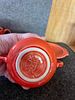 Fiesta Ceramic Cream and Sugar Set with Tray. A three-piece orange-red ceramic set featuring a Image - 3