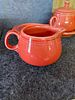 Fiesta Ceramic Cream and Sugar Set with Tray. A three-piece orange-red ceramic set featuring a Image - 4