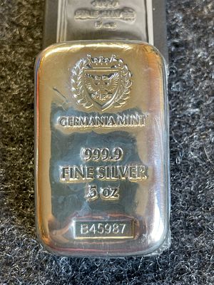 Germania Mint 5 oz 999.9 Fine Silver Cast Bar. A 5 oz Germania Mint 999.9 fine silver cast 