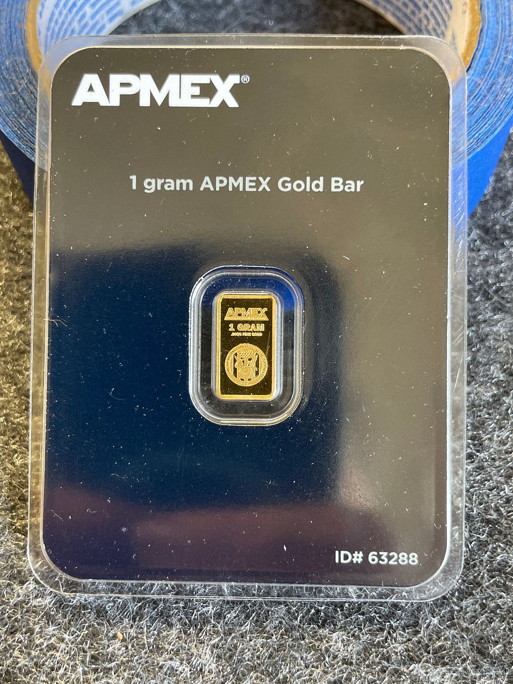 APMEX 1 Gram Gold Bar .9999 Fine Gold Bullion. A single 1 gram APMEX gold bar of .9999 fine gold 