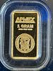 APMEX 1 Gram Gold Bar .9999 Fine Gold Bullion. A single 1 gram APMEX gold bar of .9999 fine gold Image - 1