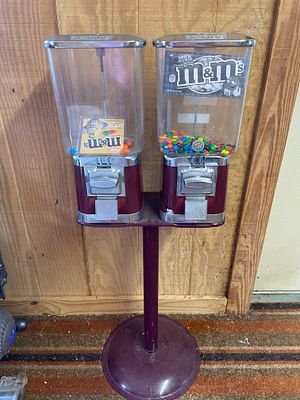 A Pair of V-Line M&M's Candy Dispensers on Pedestal Stand. A pair of V-Line candy dispensers 