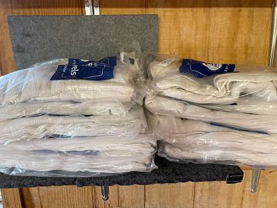 A Collection of Choice Brand White Terry Bar Towels 10 packs. A collection of 10 packs of white 