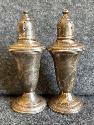 A Pair of Empire Sterling Silver Weighted Salt Pepper Shakers. A pair of Empire sterling silver 