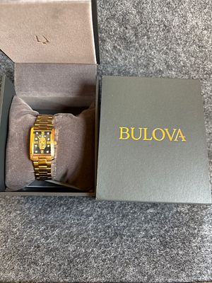 Bulova Our Lady of Guadalupe Gold Tone Wristwatch 97P169. A gold-toned Bulova wristwatch 