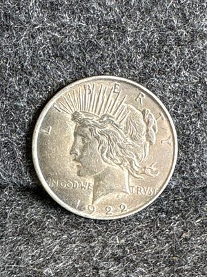 1922 S United States Peace Silver Dollar Coin. A 1922 silver-toned United States Peace Dollar 
