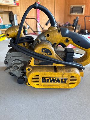 DeWALT DW433 3 Inch x 21 Inch Variable Speed Belt Sander. A DeWALT DW433 corded variable speed 