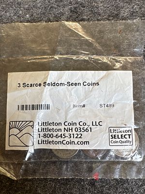 A Trio of Early 20th-Century United States Coins, Littleton Coin Co. Item ST489. A trio of 