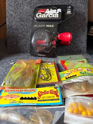 Abu Garcia Black Max Baitcasting Reel and Fishing Lure Collection. A collection of fishing gear 
