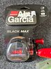 Abu Garcia Black Max Baitcasting Reel and Fishing Lure Collection. A collection of fishing gear Image - 1
