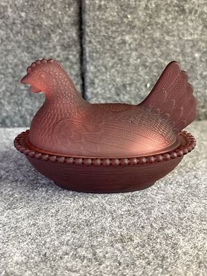 A Frosted / satin Glass Hen on Nest Covered Dish. A two-piece covered candy dish in the form of 