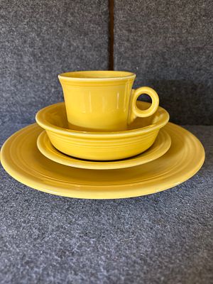A Collection of Homer Laughlin Fiesta Yellow Glazed Ceramic Dinnerware. A collection of yellow 