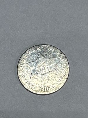 US 1862 Silver Three-Cent Piece. This US 1862 silver three-cent piece, commonly known as a trime 