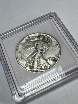1943 US Walking Liberty Half Dollar. A 1943 US Walking Liberty half dollar struck by the 