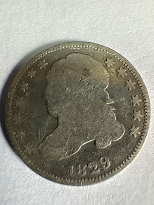 1829 US Capped Bust Silver Dime. A US Capped Bust silver dime dated 1829. The coin features the 