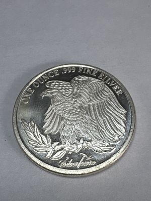 SilverTowne 1 Ounce .999 Fine Silver Saint-Gaudens Style Round. This private mint silver round 