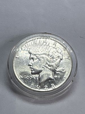 US 1923-S Peace Silver Dollar. This US 1923-S Peace silver dollar is composed of 90% silver and 