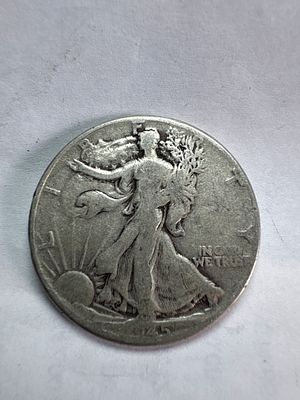 1945 US Walking Liberty Silver Half Dollar. 1945 US Walking Liberty half dollar. The obverse 