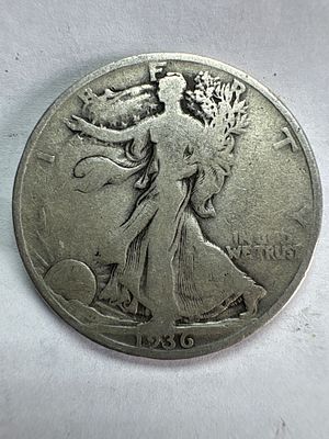 1936 US Walking Liberty Silver Half Dollar. This 1936 US silver half dollar features the Walking 
