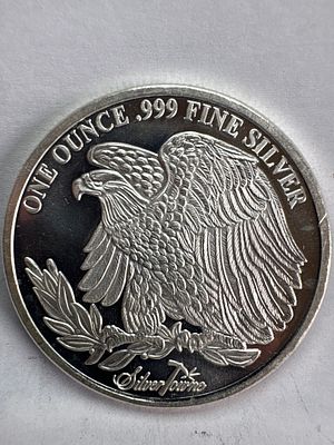 1 oz SilverTowne Saint-Gaudens Design .999 Fine Silver Round. SilverTowne Saint-Gaudens design 