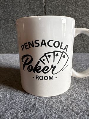 Liquid Logic Pensacola Poker Room Ceramic Mug. This white ceramic mug features a black Pensacola 