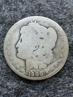 1900-S US Morgan Silver Dollar. This US Morgan silver dollar was struck in 1900 at the San 