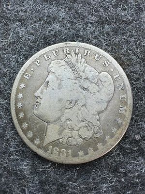 US 1881-O Morgan Silver Dollar. This US Morgan Silver Dollar was struck in 1881 at the New 